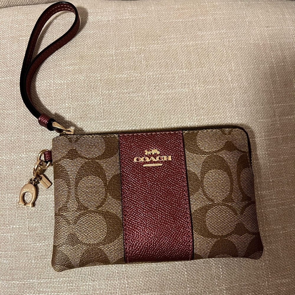 Coach wristlet. Basically brand new, never used!